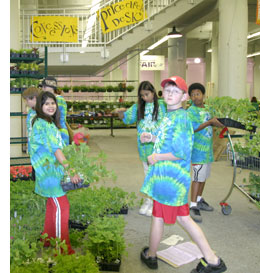 Kids working at plant sale.