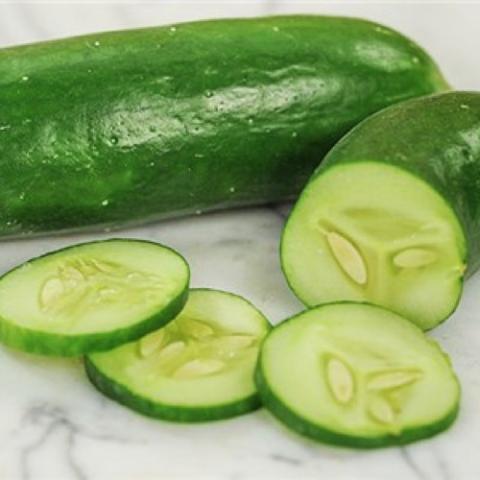 Muncher cucumber, green shiny outside, light green inside